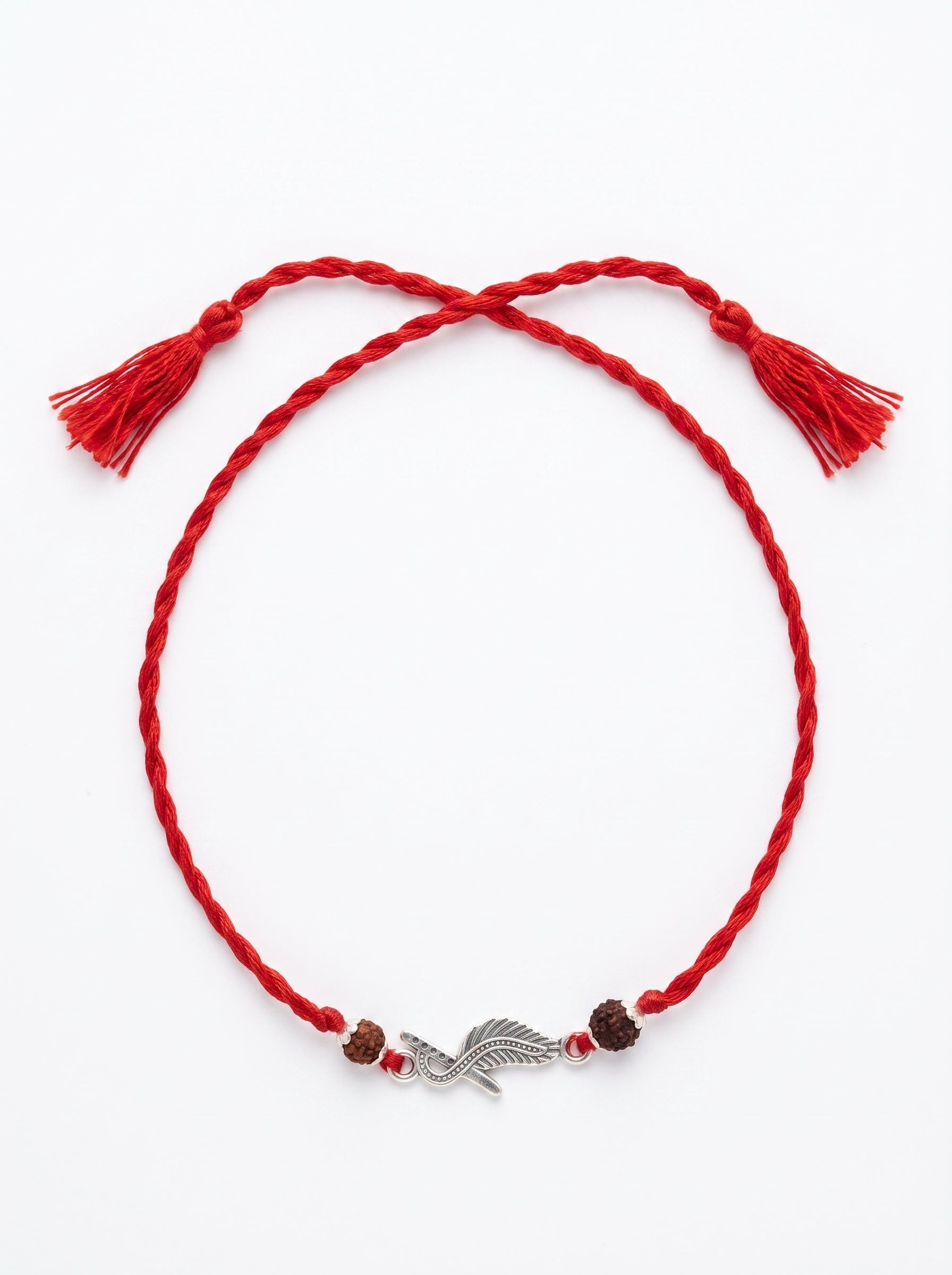 Mor Pankh Silver Rakhi with Rudraksha - Red - studio product photo - Hardik Jewels