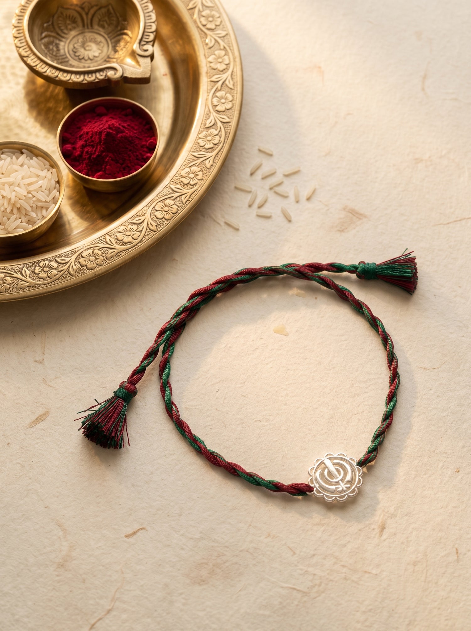 Khanda Silver Rakhi - Red Green Thread