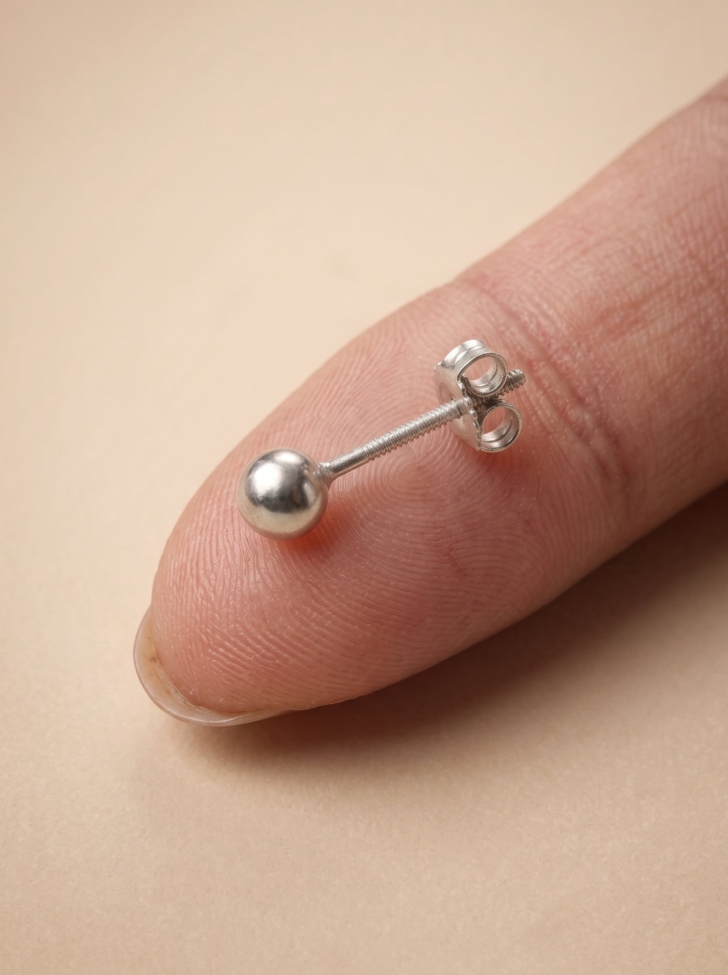 Minimal Silver Ball Stud Earrings - close-up detail view - Hardik Jewels