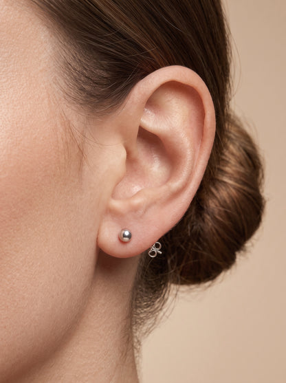 Minimal Silver Ball Stud Earrings - ear styling view - Hardik Jewels