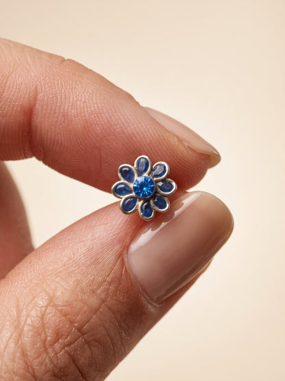 Blue Enamel Flower Silver Stud Earrings - close-up detail view - Hardik Jewels