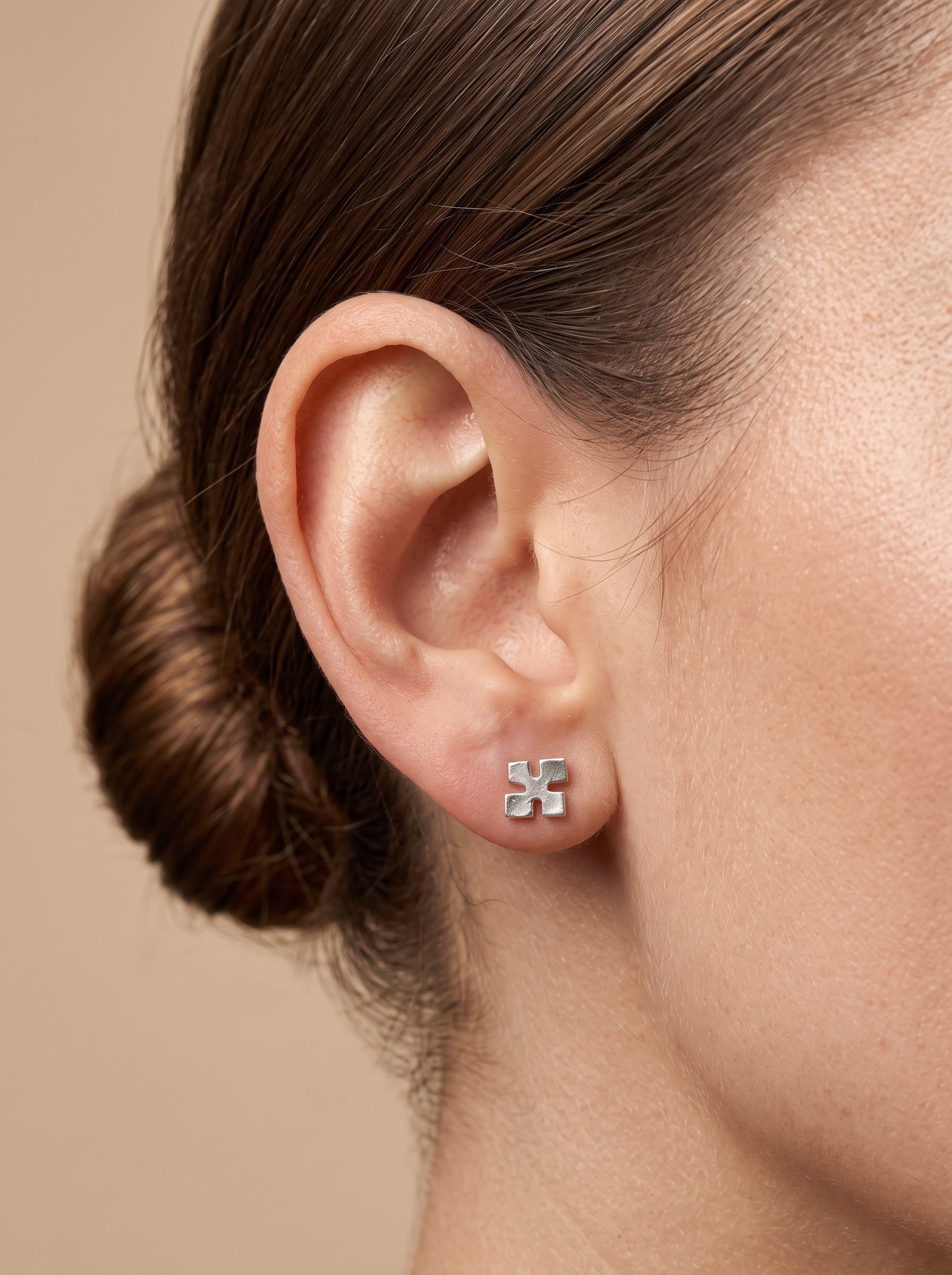 Minimal Cross Silver Stud Earrings - ear styling view - Hardik Jewels