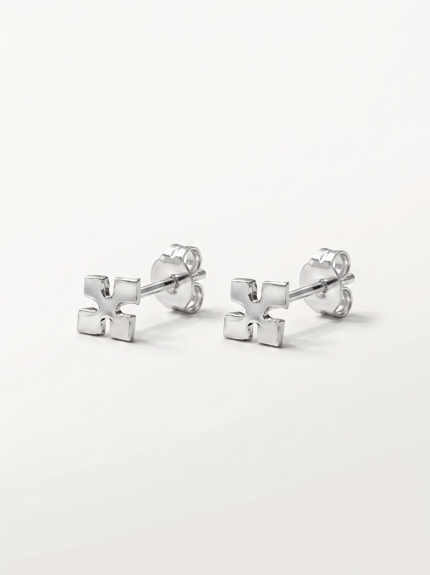 Minimal Cross Silver Stud Earrings - front studio product view - Hardik Jewels