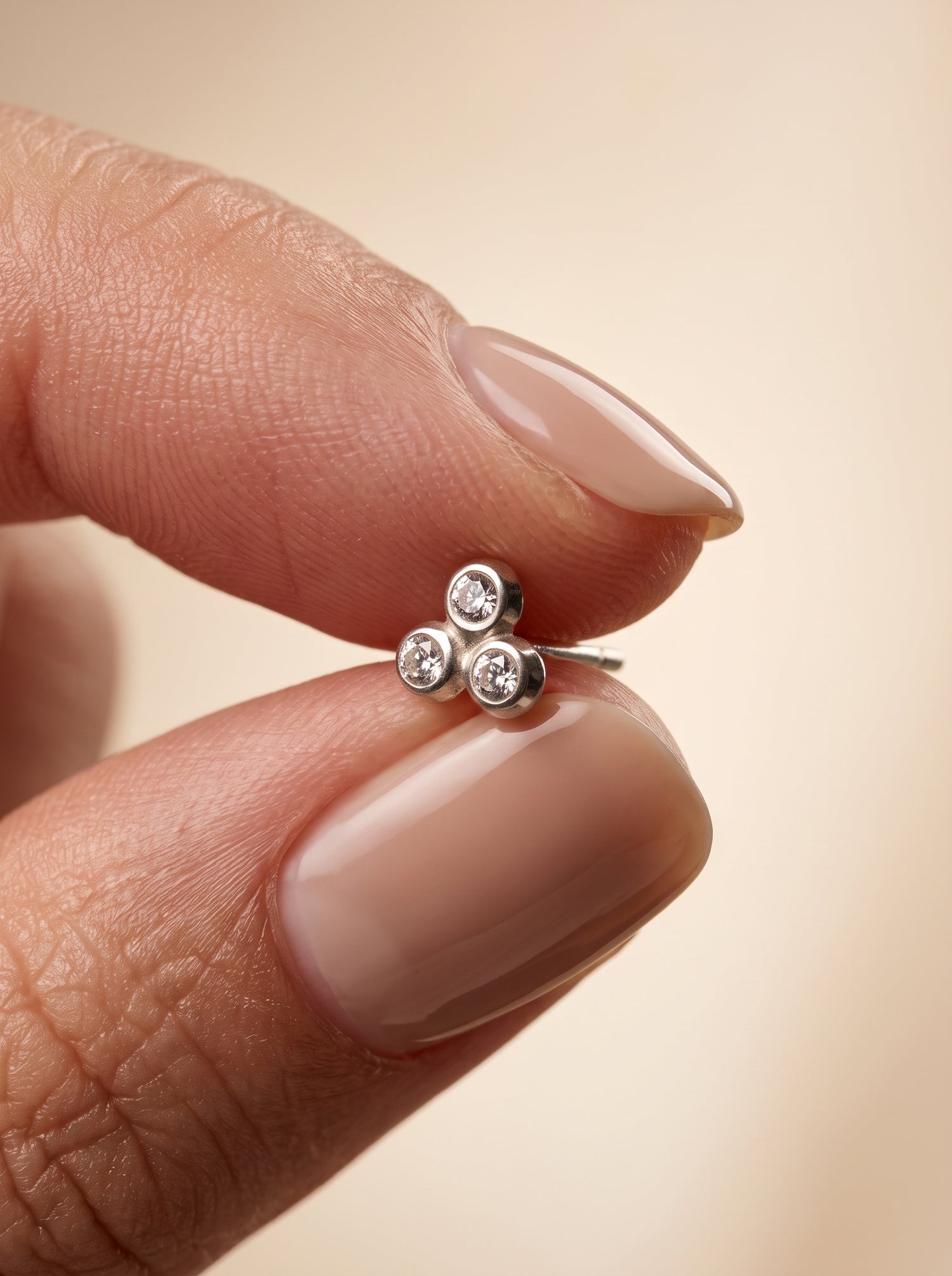 Triple CZ Cluster Silver Stud Earrings - close-up detail view - Hardik Jewels