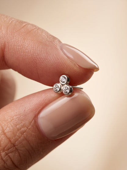 Triple CZ Cluster Silver Stud Earrings - close-up detail view - Hardik Jewels