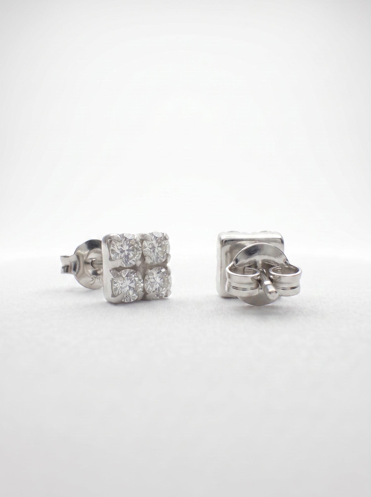Square Four CZ Silver Stud Earrings - front studio product view - Hardik Jewels