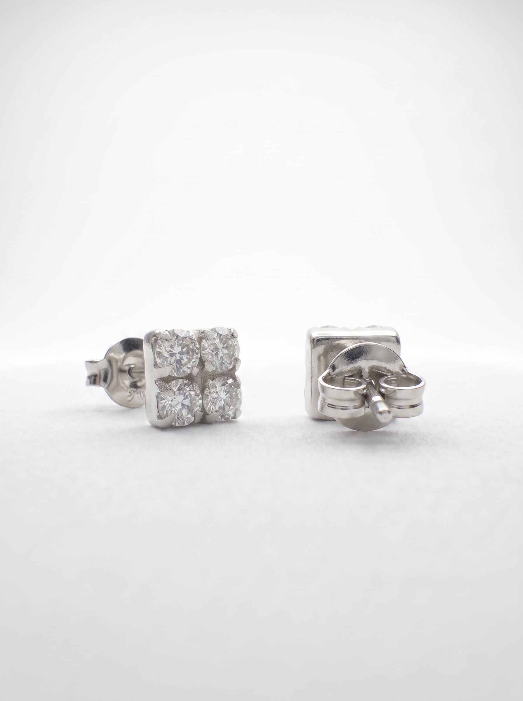 Square Four CZ Silver Stud Earrings - front studio product view - Hardik Jewels