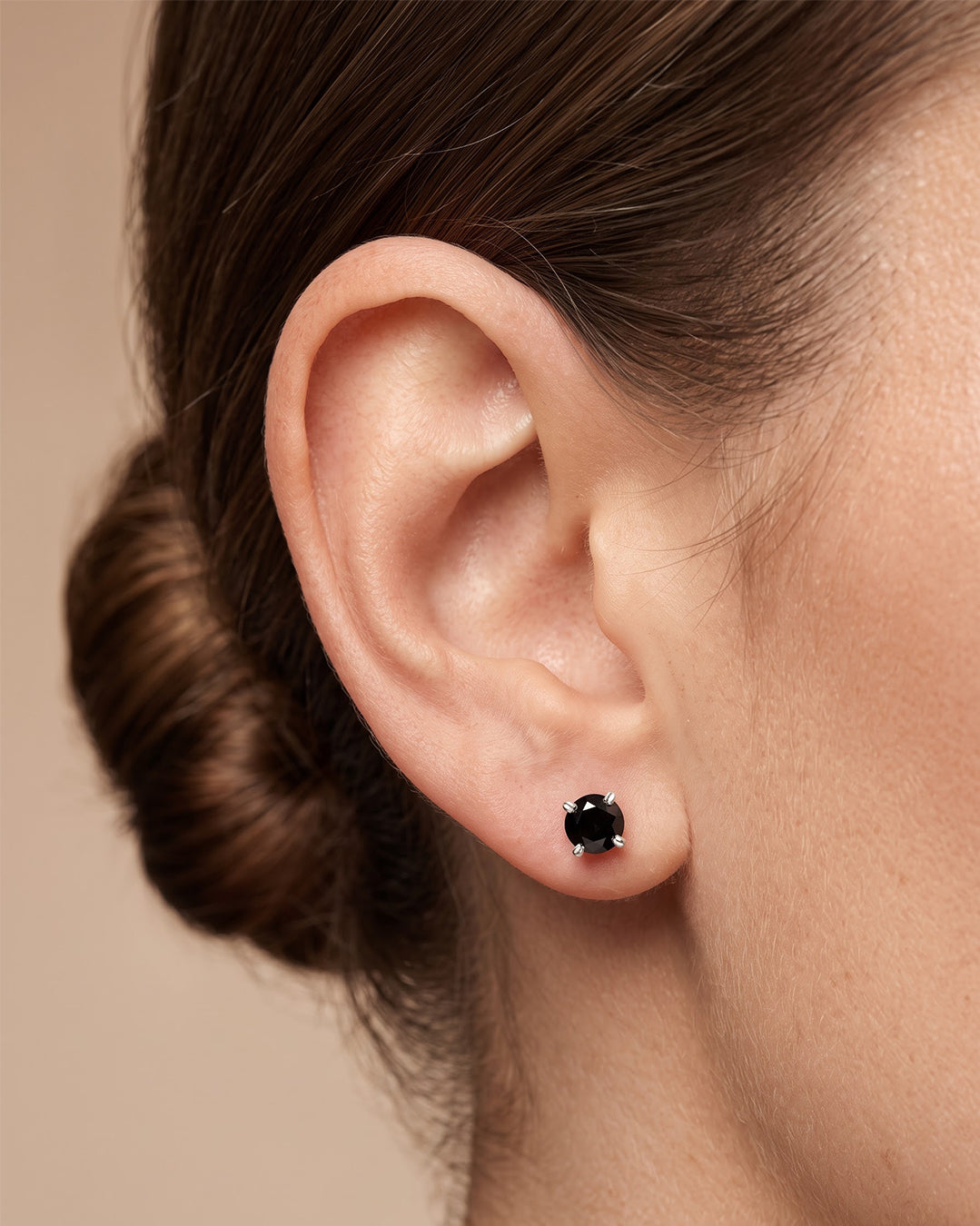 Black CZ Solitaire Silver Stud Earrings - ear styling view - Hardik Jewels