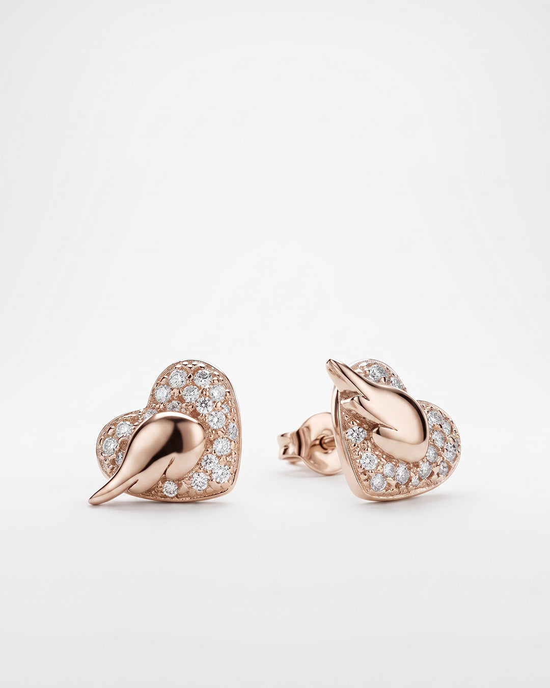 Mother of Pearl Heart Wing CZ Silver Stud Earrings - white background detail view - Hardik Jewels