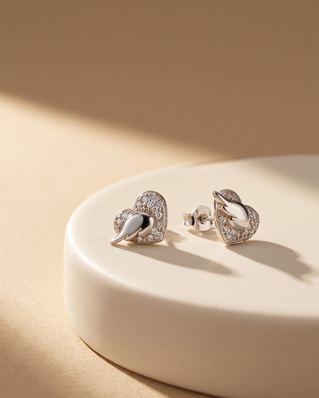 Mother of Pearl Heart Wing CZ Silver Stud Earrings - premium jewellery display - Hardik Jewels