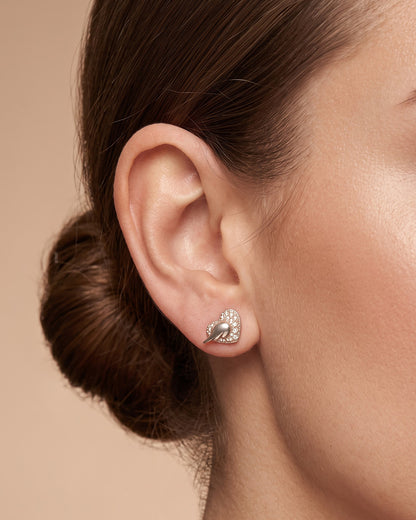 Mother of Pearl Heart Wing CZ Silver Stud Earrings - ear styling view - Hardik Jewels