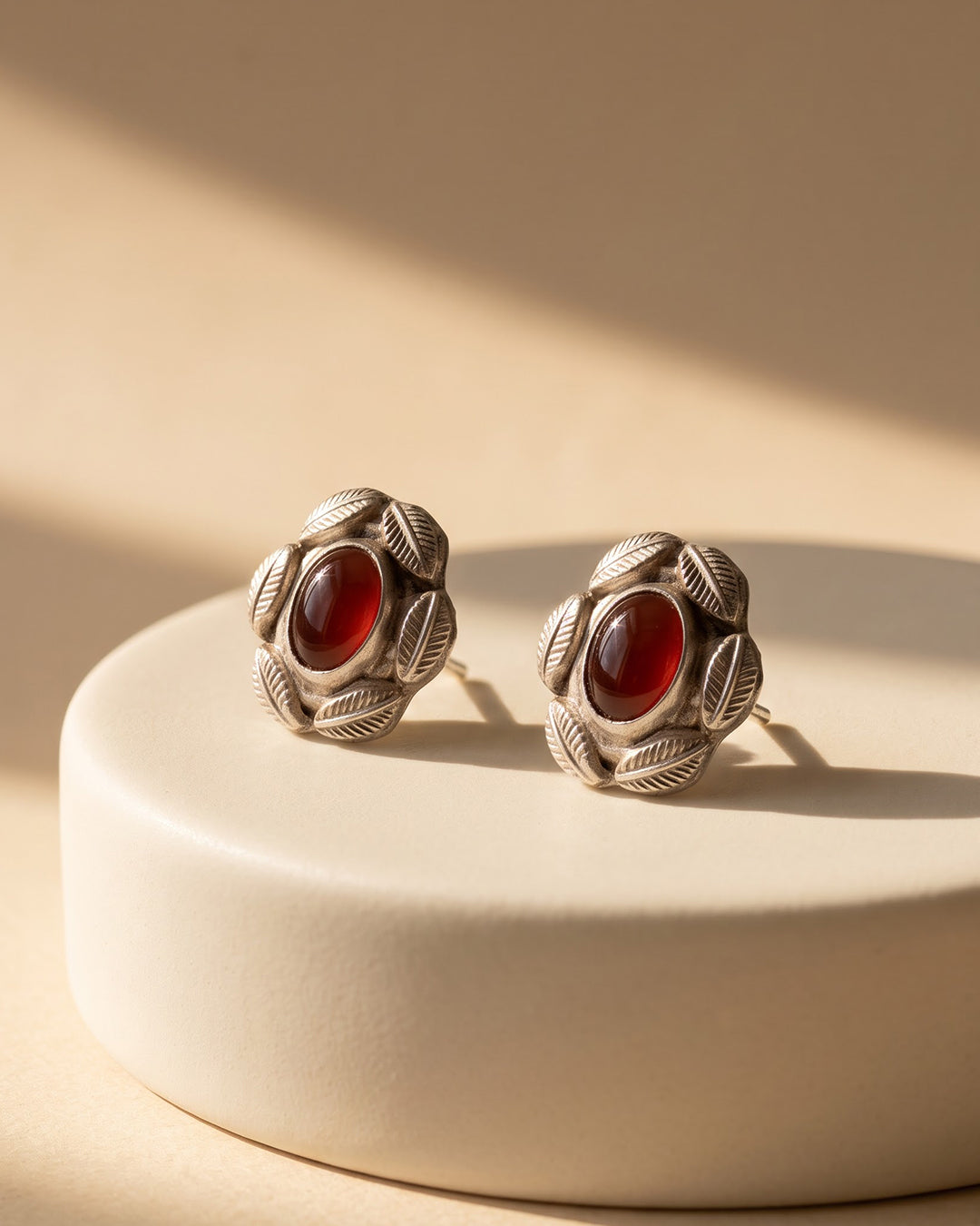 Vintage Red Stone Leaf Frame Silver Stud Earrings - premium jewellery display - Hardik Jewels