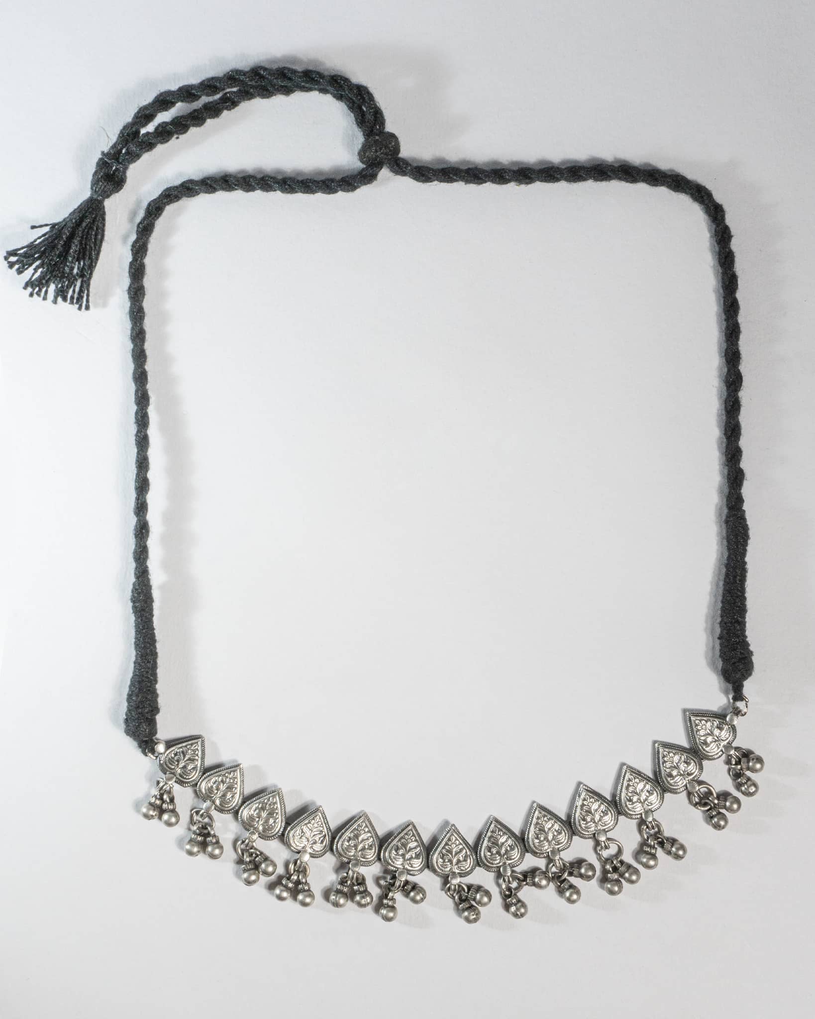 Necklace with decorative elements on a white background