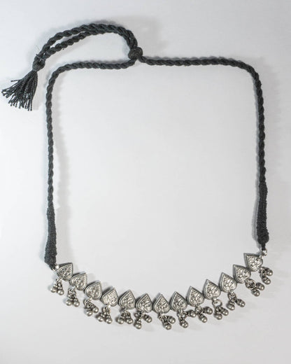 Necklace with decorative elements on a white background