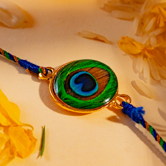 Hardik Jewels Peacock Rakhi Online - Elegant Silver Design.