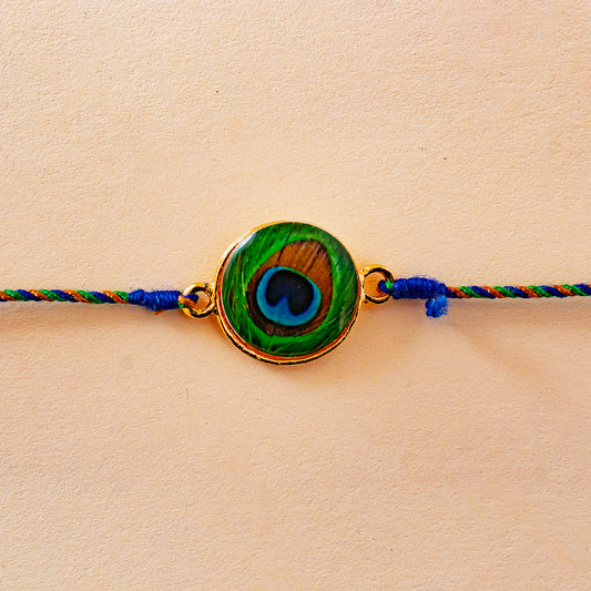 Hardik Jewels Peacock Rakhi Online - Elegant Silver Design.