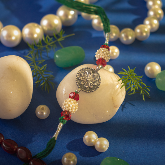 Hardik Jewels Pearl Bead Rakhi Silver - Handcrafted Elegance.