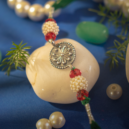 Hardik Jewels Pearl Bead Rakhi Silver - Handcrafted Elegance.