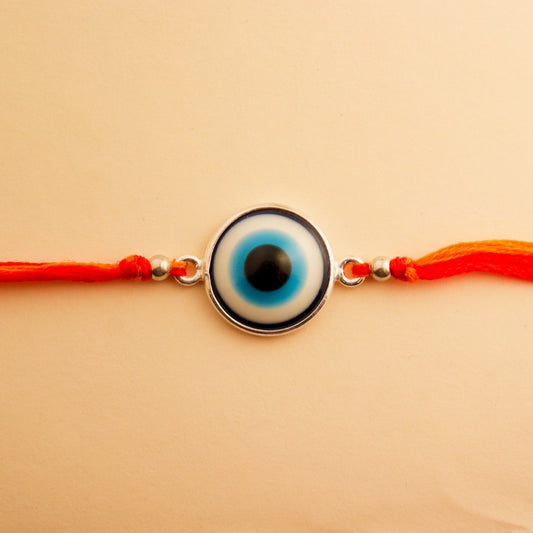 Handcrafted Sterling Silver Evil Eye Rakhi by Hardik Jewels.